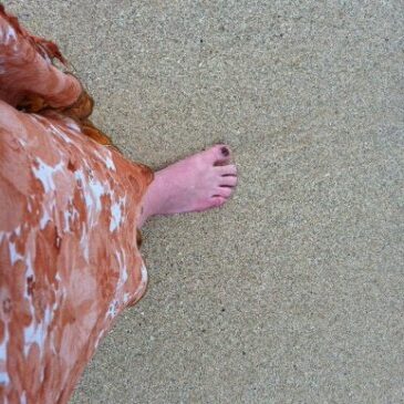 Bare feet in the sand. Being authentic to yourself.